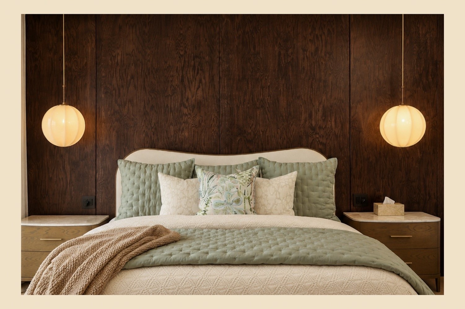 Primary bedroom with dark wood feature wall and pendant lights