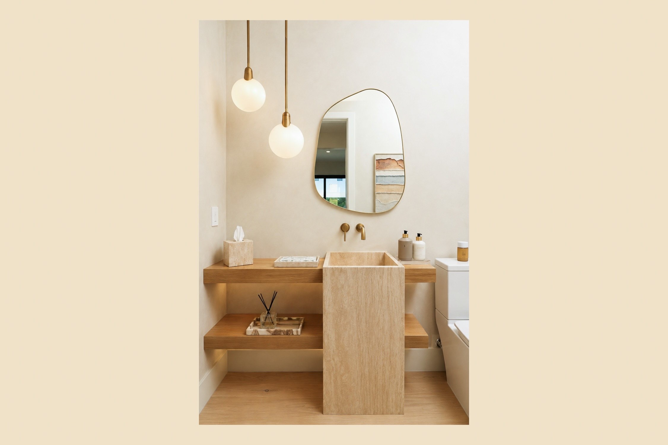 Minimal wood vanity with round mirror and pendant lighting